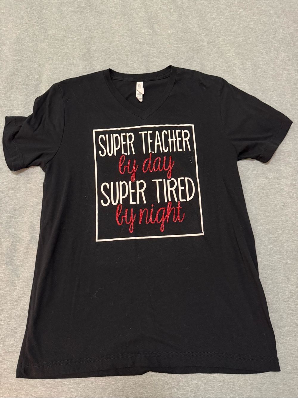 Bella Canvas Black Short Sleeve Tee with White and Red Text